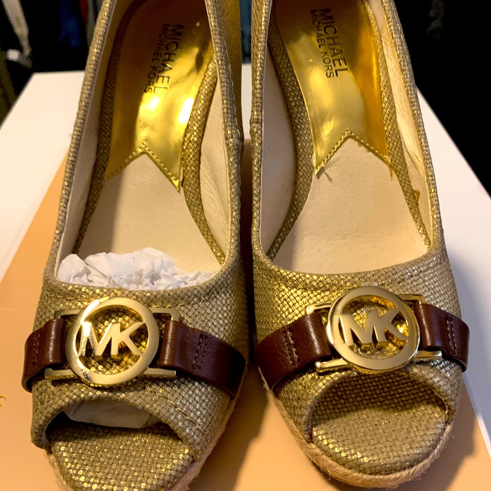 Beautiful pair of canvas wedge shoes.
